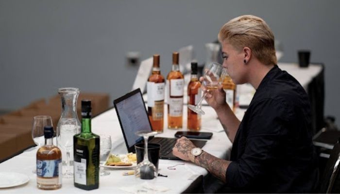 Devin Walden, Master Distiller of Tropical Distillers, judging at USA Spirits Ratings when she was a buyer at Total Wine and More.
