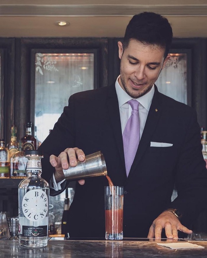 Luca Rapetti pouring a cocktail