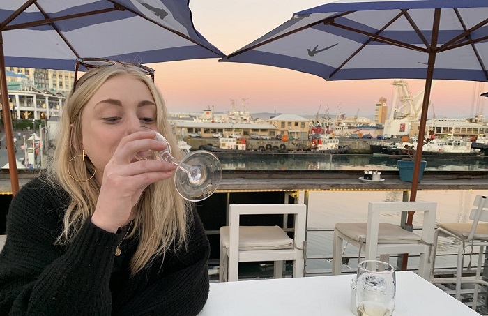 Emilia Wrelton enjoying a glass of wine